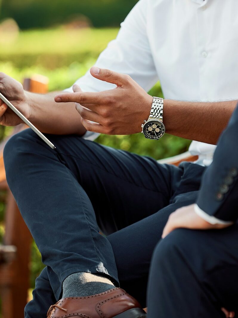 two people sitting during day